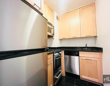 East 36 Street - Photo Thumbnail 3