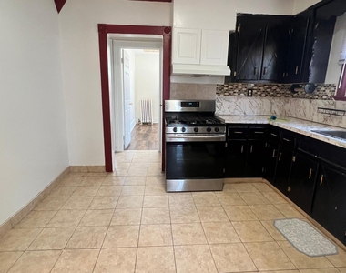1409 East 48 Street - Photo Thumbnail 2