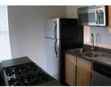 1122 N Zang Boulevard - Photo Thumbnail 3