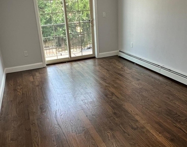 196-28 91st Avenue - Photo Thumbnail 4