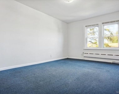 85-74 67th Avenue - Photo Thumbnail 4