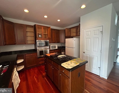 8177 Mccauley Way - Photo Thumbnail 2