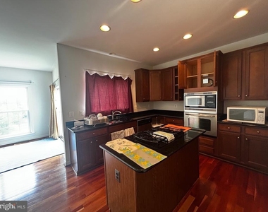 8177 Mccauley Way - Photo Thumbnail 3