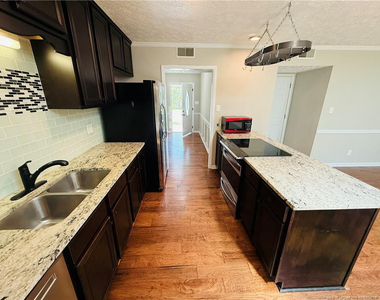 6927 Wickersham Drive - Photo Thumbnail 4