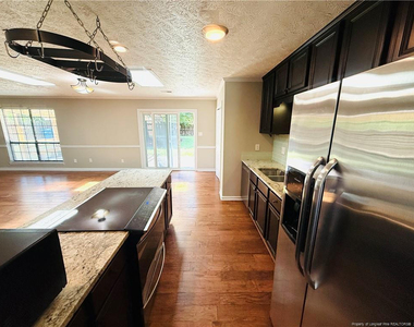 6927 Wickersham Drive - Photo Thumbnail 2