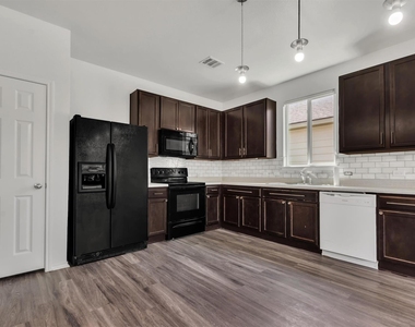 9300 China Rose Dr - Photo Thumbnail 13