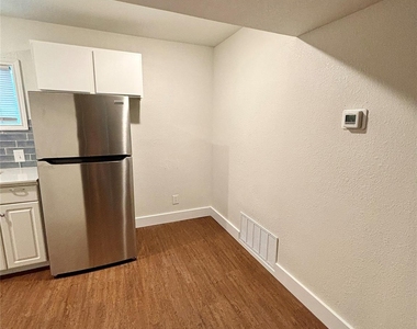 1115 Haynes St - Photo Thumbnail 4