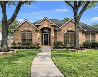 16807 Laguna Springs Drive - Photo Thumbnail 2
