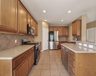 4702 Autumn Orchard Lane - Photo Thumbnail 4