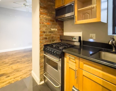 E 13th St. - Photo Thumbnail 1