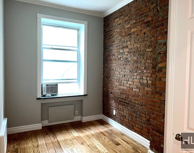 E 16th St. - Photo Thumbnail 4