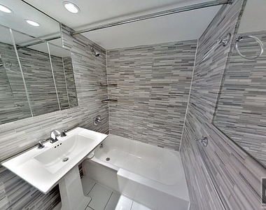 E 100th St. - Photo Thumbnail 4
