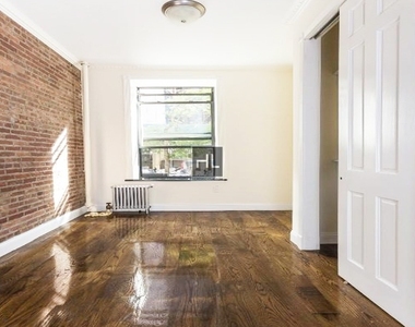 W 103rd St. - Photo Thumbnail 1