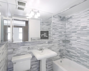 W 103rd St. - Photo Thumbnail 4