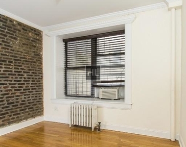 E 13th St. - Photo Thumbnail 1