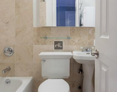 E 13th St. - Photo Thumbnail 4