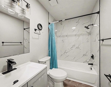 9208 N Connechusett Road - Photo Thumbnail 18