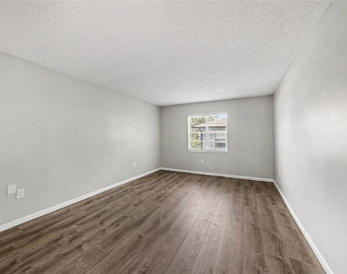 9208 N Connechusett Road - Photo Thumbnail 16