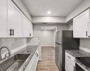 9208 N Connechusett Road - Photo Thumbnail 10