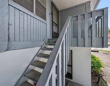 9208 N Connechusett Road - Photo Thumbnail 2