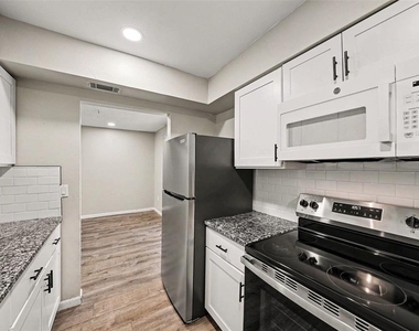 9208 N Connechusett Road - Photo Thumbnail 8