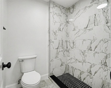 9208 N Connechusett Road - Photo Thumbnail 18