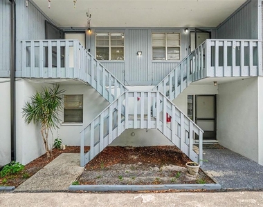 9208 N Connechusett Road - Photo Thumbnail 3