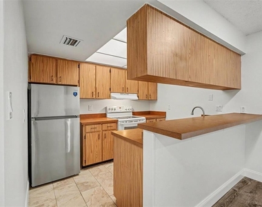 9208 N Connechusett Road - Photo Thumbnail 13