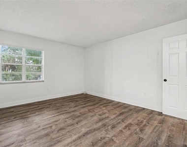 9208 N Connechusett Road - Photo Thumbnail 15