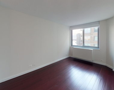 401 E 34th St - Photo Thumbnail 3