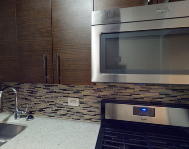 401 E 34th St - Photo Thumbnail 3