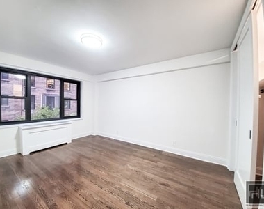 East 56 Street - Photo Thumbnail 6