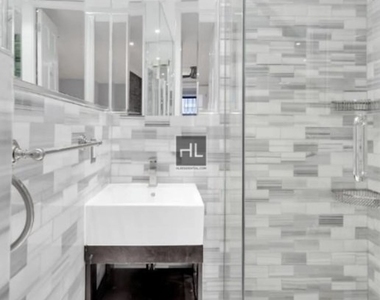 E 26th St. - Photo Thumbnail 2