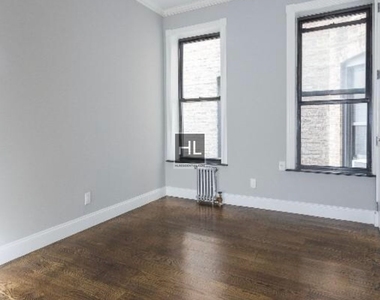 W 103rd St. - Photo Thumbnail 3