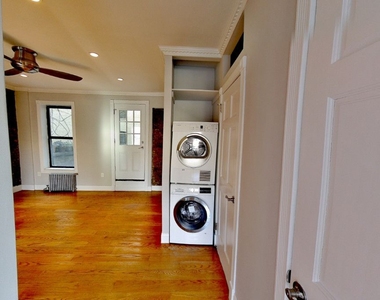 E 100th St. - Photo Thumbnail 4