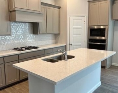 9313 Winding Creek Drive - Photo Thumbnail 3