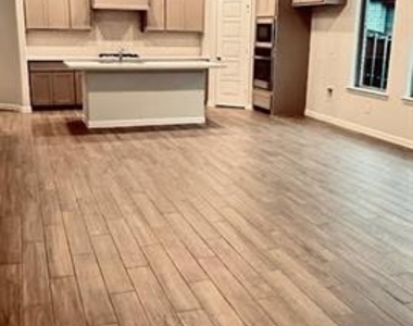 9313 Winding Creek Drive - Photo Thumbnail 2
