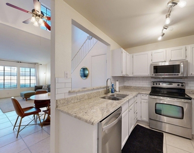 8625 E Belleview Place - Photo Thumbnail 2
