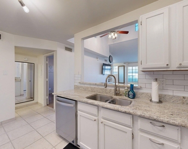 8625 E Belleview Place - Photo Thumbnail 4