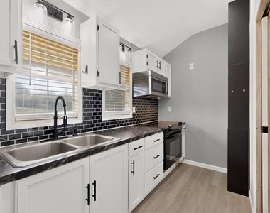 1661 E 2nd Street - Photo Thumbnail 11