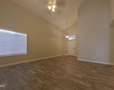1447 S 231st Lane - Photo Thumbnail 2