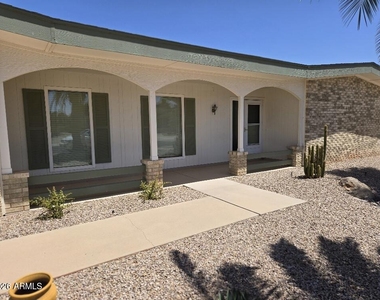 10838 W Acacia Drive - Photo Thumbnail 2