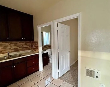 1336 W 109 Street - Photo Thumbnail 2