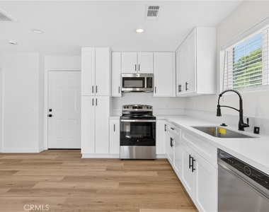 593 E 12th St - Photo Thumbnail 7