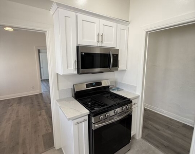 1462 W 36th Street - Photo Thumbnail 2