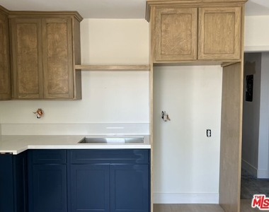 1336 W 37th Drive - Photo Thumbnail 4