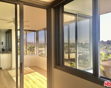 8701 Delgany Avenue - Photo Thumbnail 7