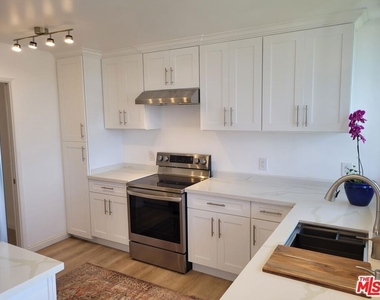 8701 Delgany Avenue - Photo Thumbnail 14