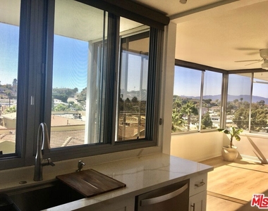 8701 Delgany Avenue - Photo Thumbnail 6