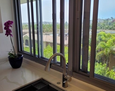 8701 Delgany Avenue - Photo Thumbnail 16